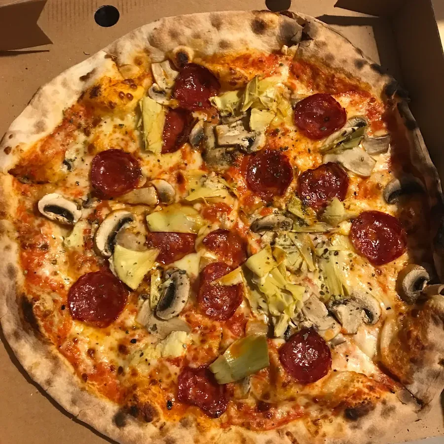 Wood-fired pepperoni, artichoke and mushroom pizza from Olivetta Pizzeria